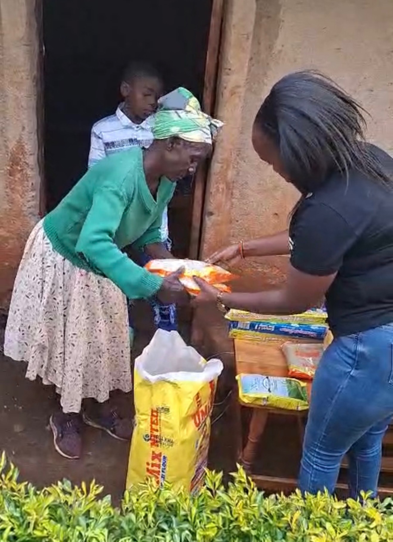 A community member receiving emergency food assistance through Hope at Home